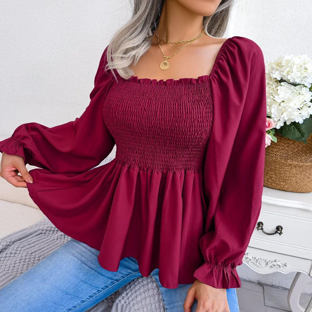 Dames gesmockte blouse met ruches