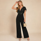 Dames jumpsuit met pailletten en wijde pijpen