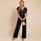 Dames jumpsuit met pailletten en wijde pijpen