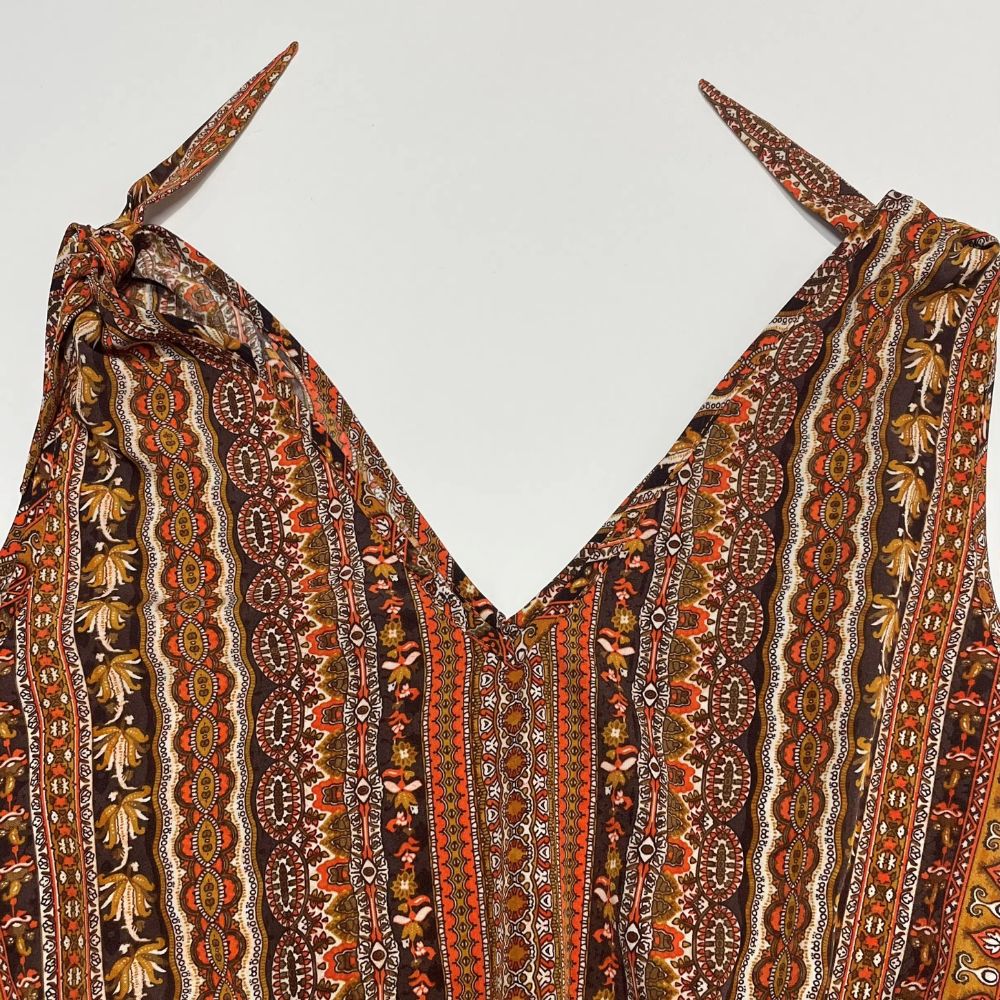 Dames jumpsuit met gestreepte wijde pijpen