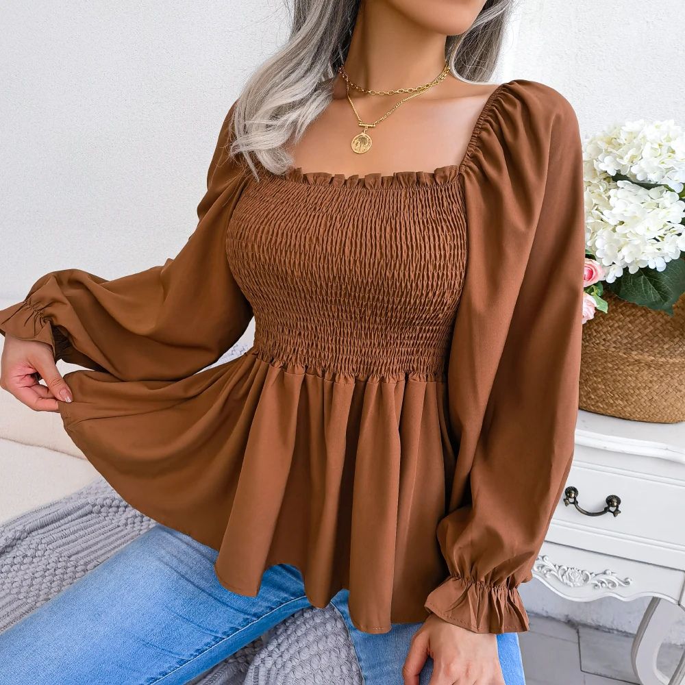 Dames gesmockte blouse met ruches